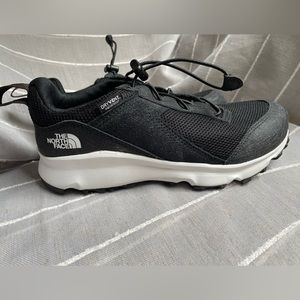 Waterproof running shoes. The North Face size 5.